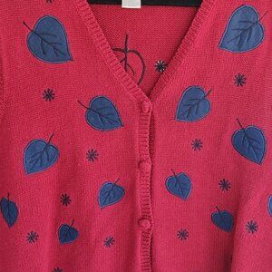 Vest, Red knit w/falling leaves and snow in blue embroidery. Christopher Banks